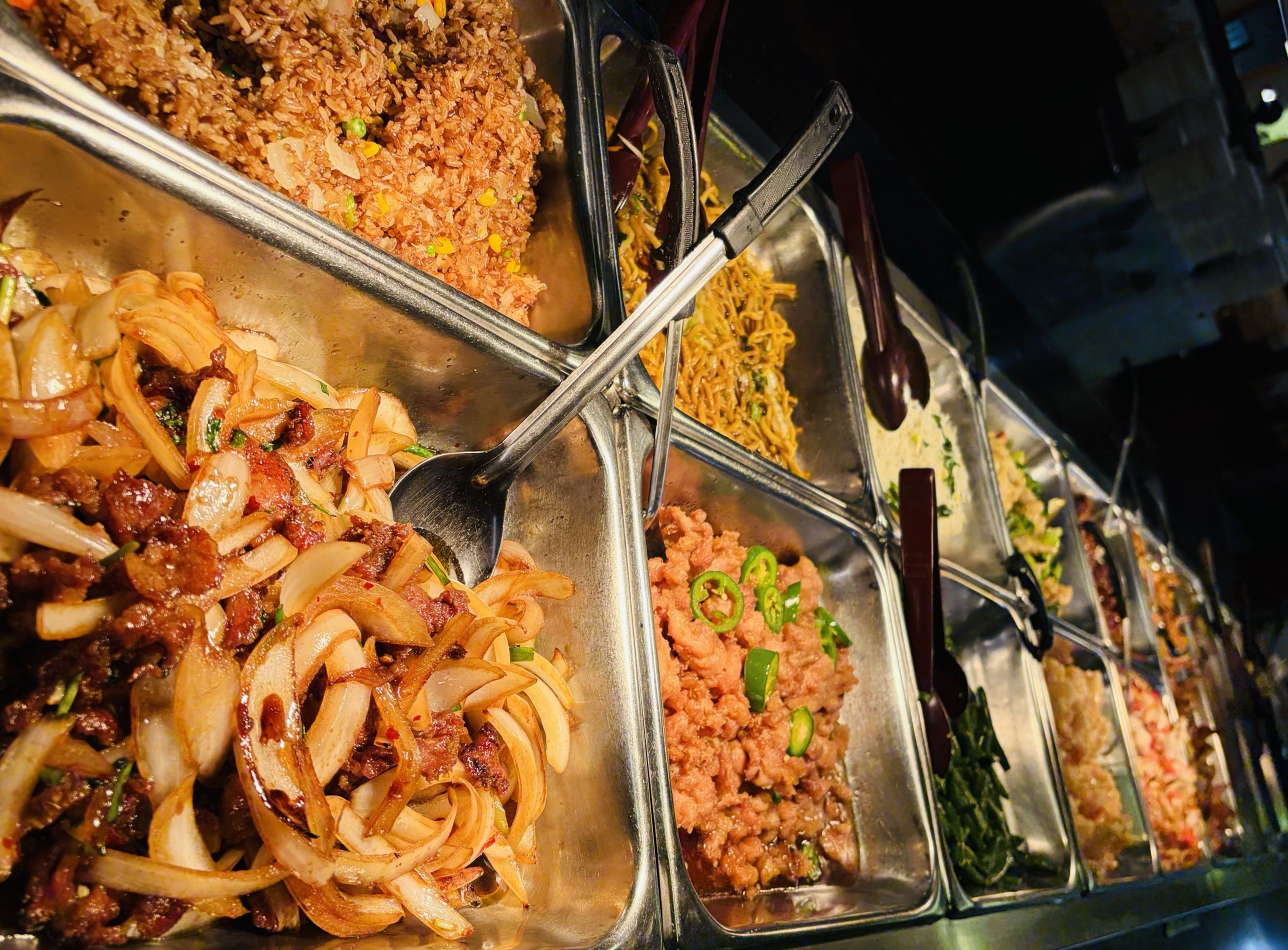 Beef with onions, fried rice, lo mein and more on our buffet line